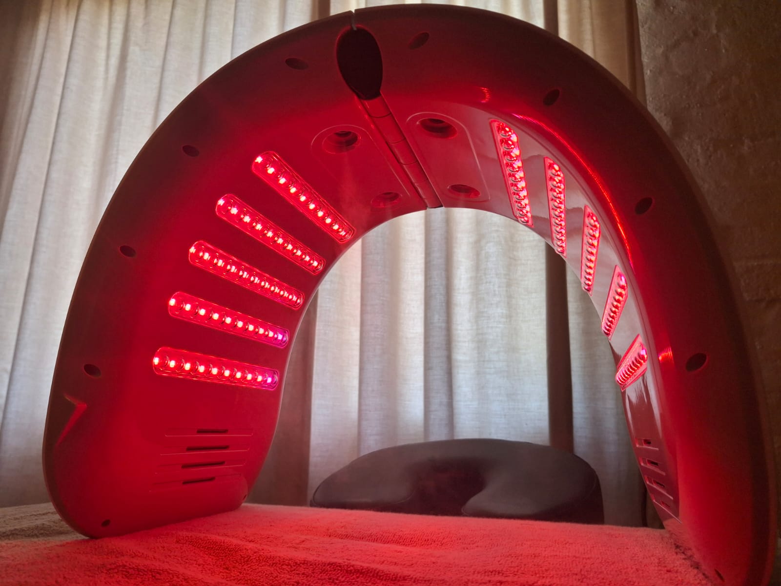The Lightspeed Recovery Halo device — arch-shaped LED treatment for face and scalp